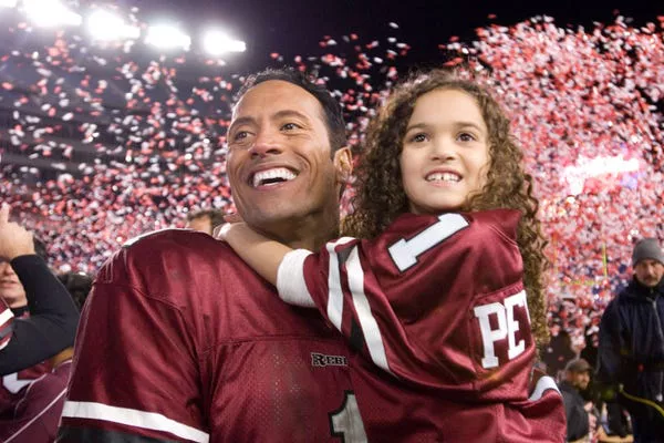 Dwayne Johnson and Madison Pettis in 'The Game Plan.' Disney