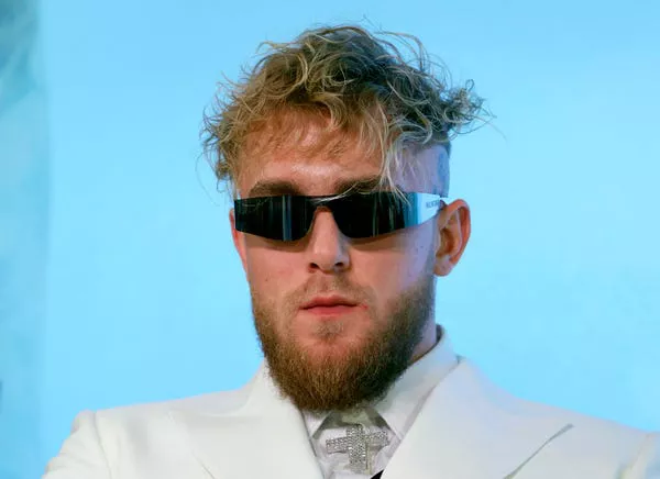 Jake Paul at a news conference to promote his 2021 fight against Tommy Fury. Ethan Miller/Getty Images