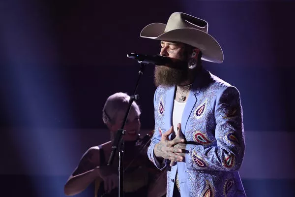 Post Malone performs at the 2024 CMA Awards.