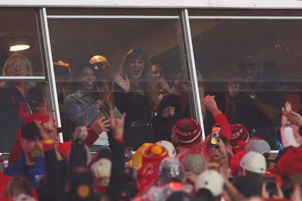 Taylor Swift waves to fans at Arrowhead Stadium on November 4, 2024.