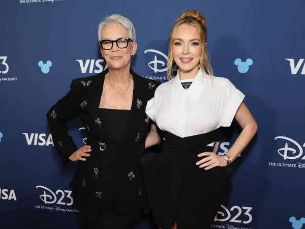 Jamie Lee Curtis and Lindsay Lohan attend D23 in August 2024 to promote 'Freakier Friday.' Rodin Eckenroth / Getty Images for Disney