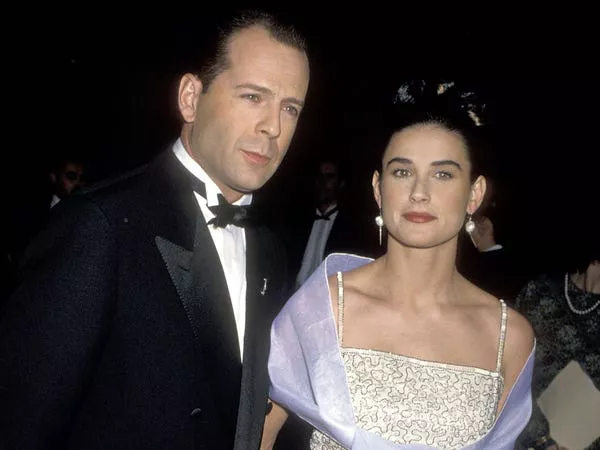 Bruce Willis y Demi Moore en 1990