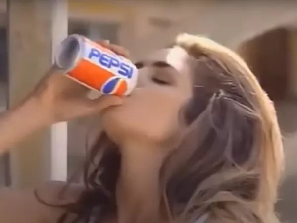 Cindy Crawford enjoyed a can of Pepsi in this iconic ad from 1992.