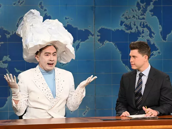 Bowen Yang as The Iceberg That Sank The Titanic and anchor Colin Jost during Weekend Update in 2021. NBC/NBCU Photo Bank/NBCUniversal/Getty Images