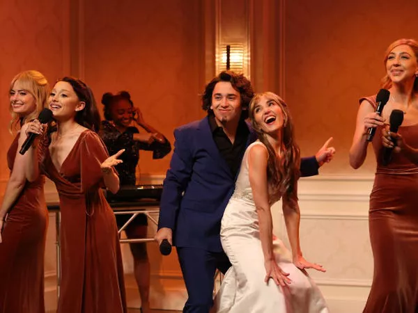 Sarah Sherman, Ariana Grande, Marcello Hernández as Domingo, Chloe Fineman as Kelsey, and Heidi Gardner during the 'Bridesmaid Speech' sketch in 2024. NBC/Will Heath/NBC/Getty Images